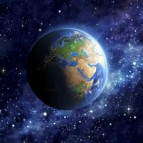 The earth in space with stars in the background.