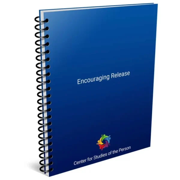 A blue spiral notebook with the words encouraging release.