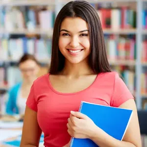 A Woman in a Coral Top Holding a File